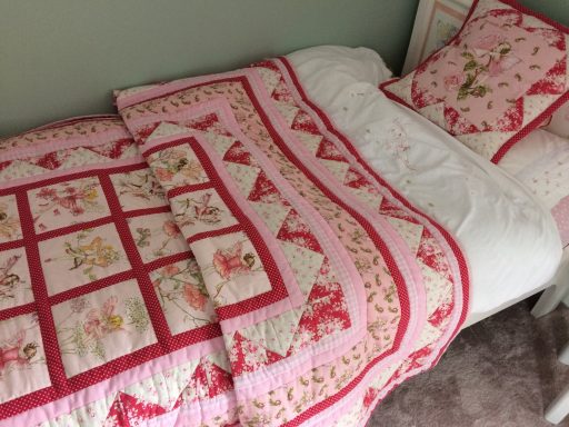 Fairy Quilt in Tilda pinks and Miniature Rose Fairy Fabric
Matching cushion